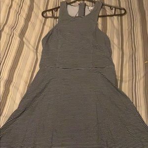 A very cute an chic black an white striped dress